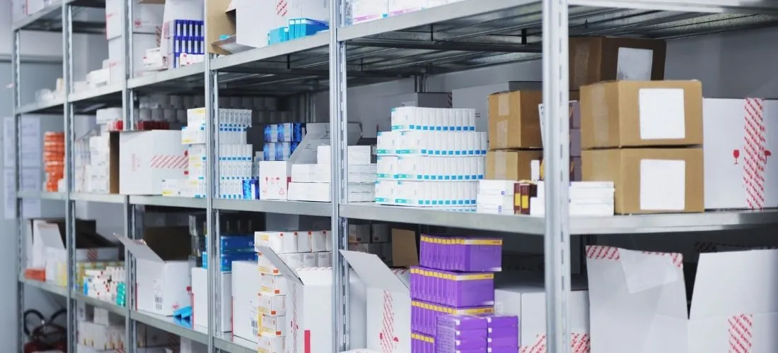 Shelves of medical supplies in a store room